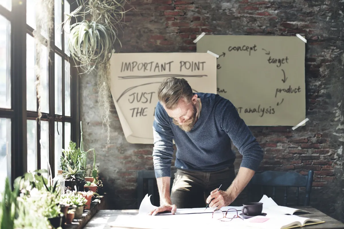 Man busy working on a plan